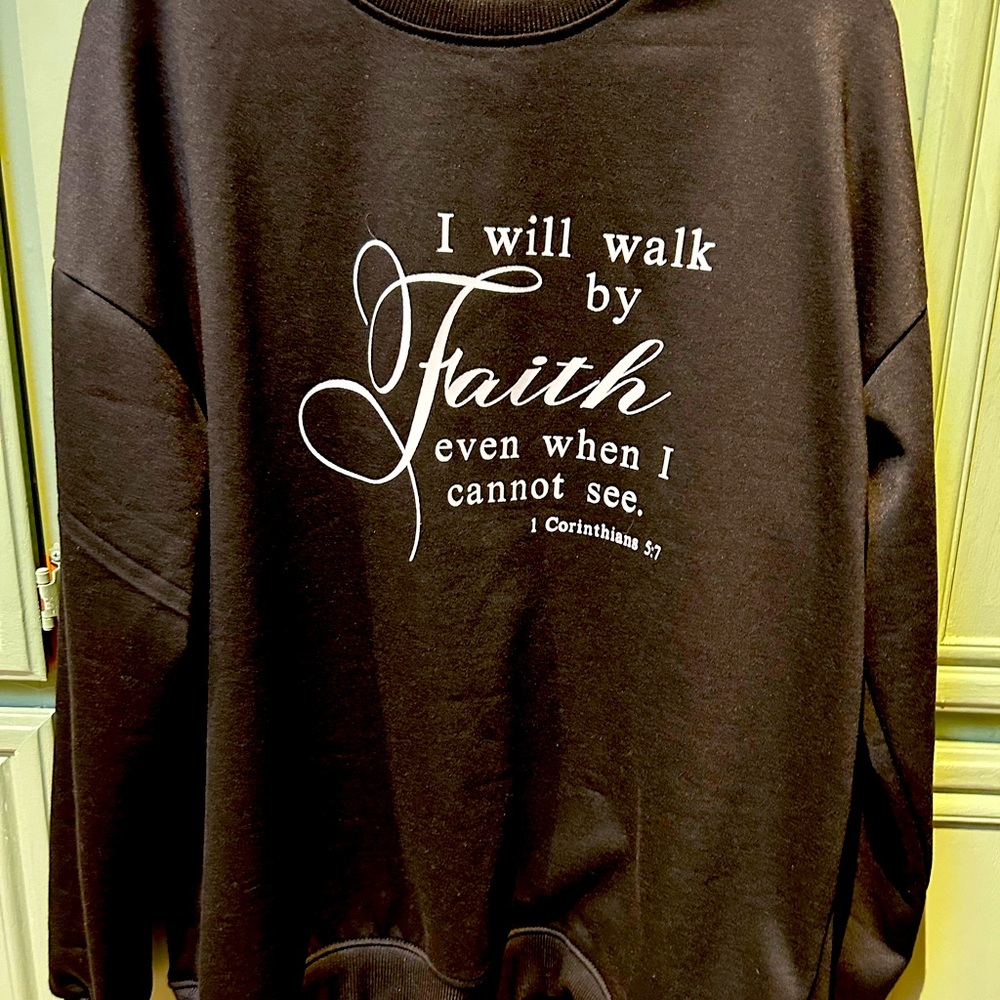 Ladies unique sweatshirt. New but no tags. Medium weight. Jet black.